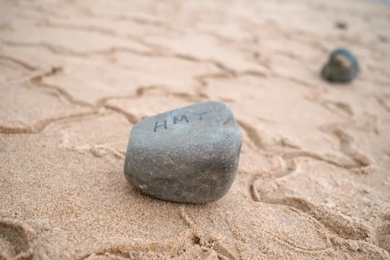 A stone labelled HMY.